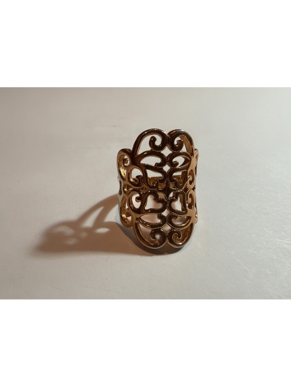 Gold tone filigree wide ring